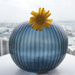 Blue vase with yellow gerbera