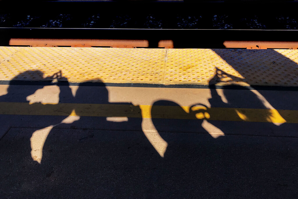 Shadow play while waiting for the train by 365projectorgchristine