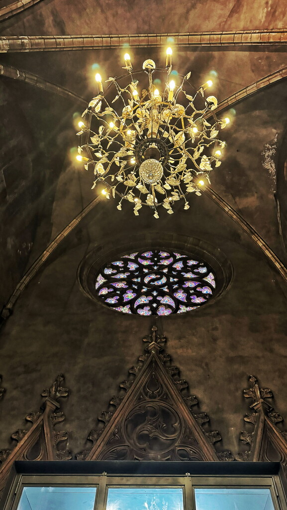 Chandelier in a church.  by cocobella