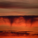 Virga clouds at sunrise by clearlightskies