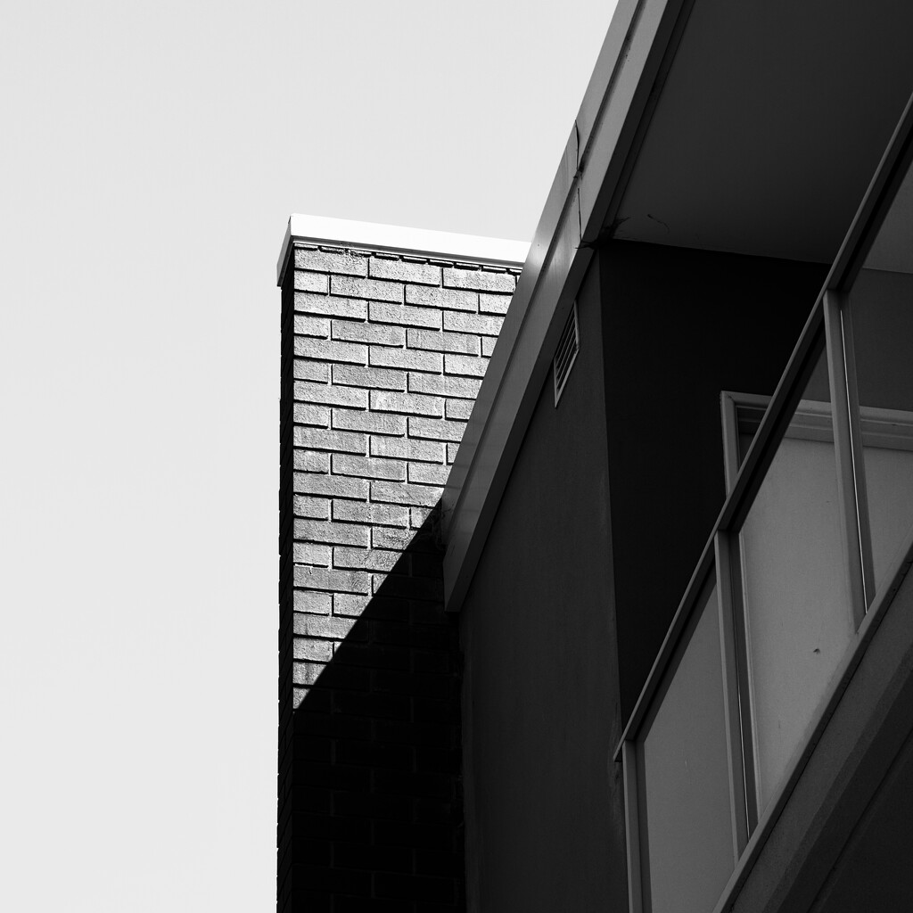 Bricks, Shadows And Balconies P2049094 by merrelyn