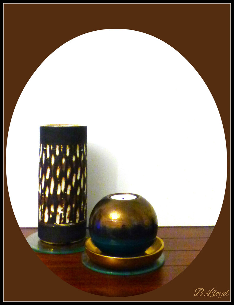 Pottery vase and globe candle-holder.  by beryl