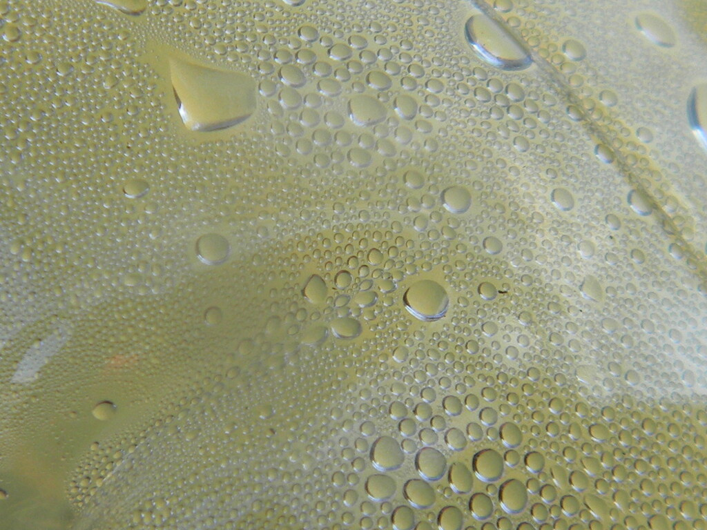 Closeup of Lemonade Condensation Bubbles by sfeldphotos