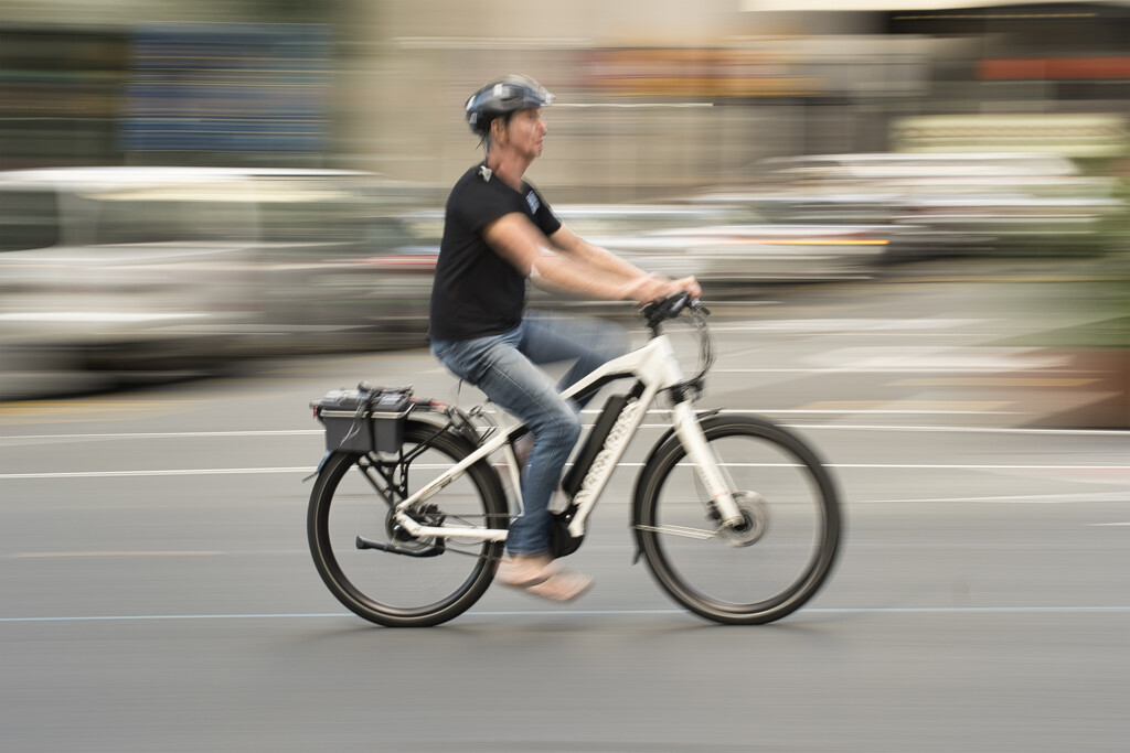Queen Street cyclist by dkbarnett