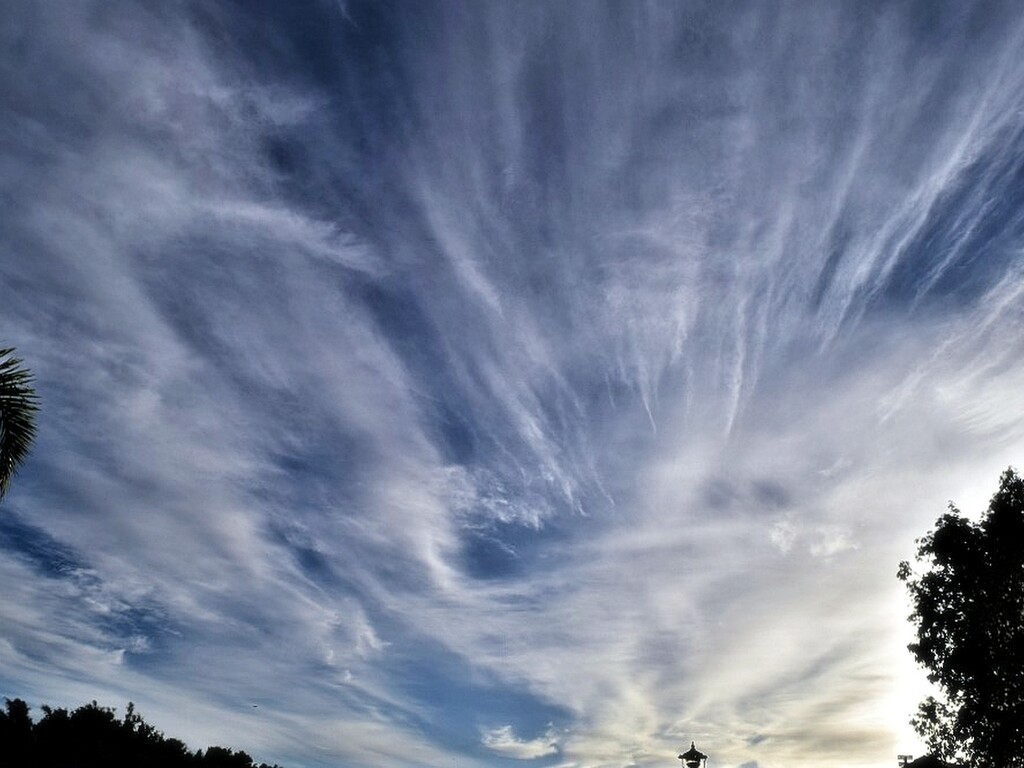 Streaky Clouds ~ by happysnaps
