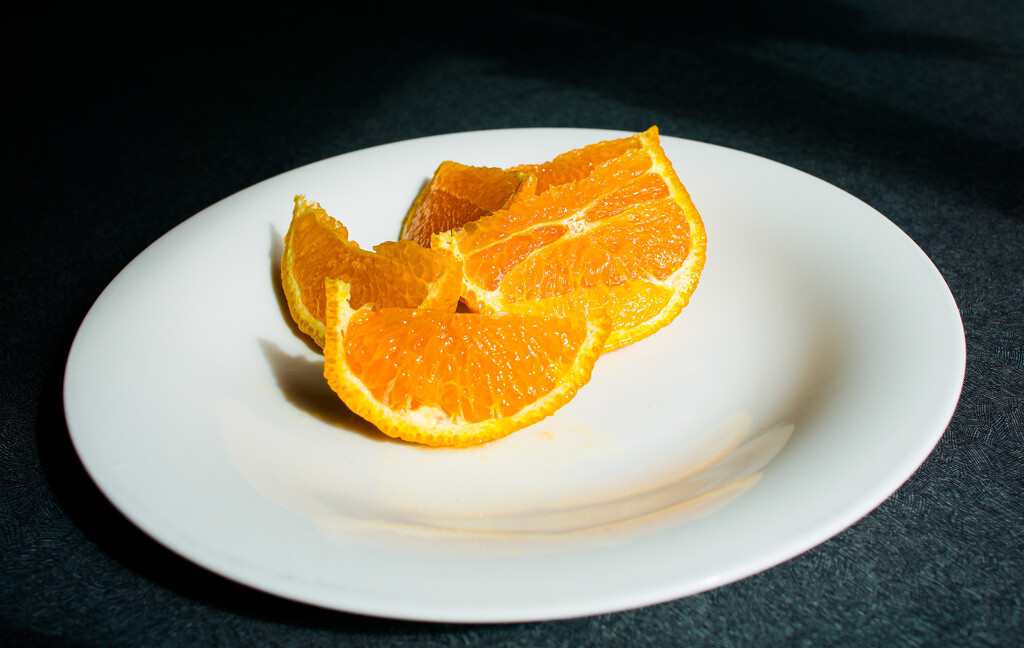Sliced orange by cristinaledesma33