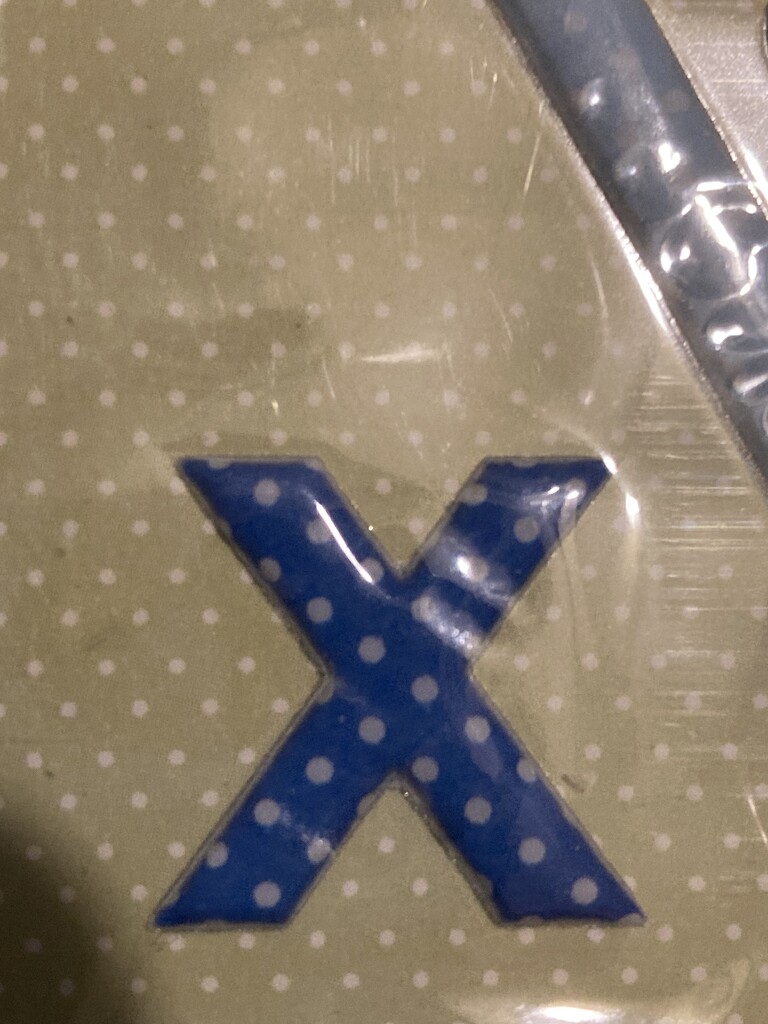 X with Polka Dots  by spanishliz