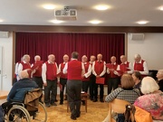 12th Mar 2024 - A men's choir sings at the seniors' meeting. 