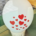 Hearts on a balloon.  by cocobella