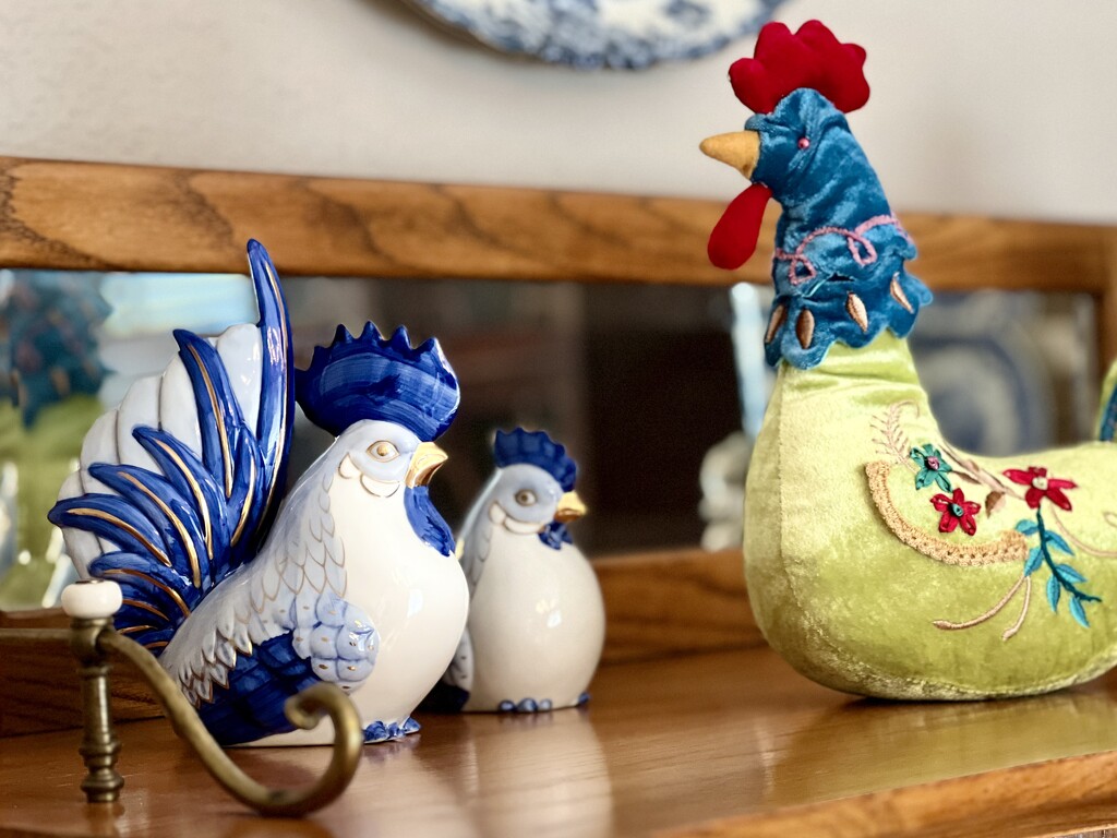 Felipè and the Herend chickens on the China cabinet by louannwarren