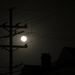Moon through the powerlines