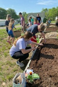 1st May 2024 - Teaching kids how to plant flowers and vegetables