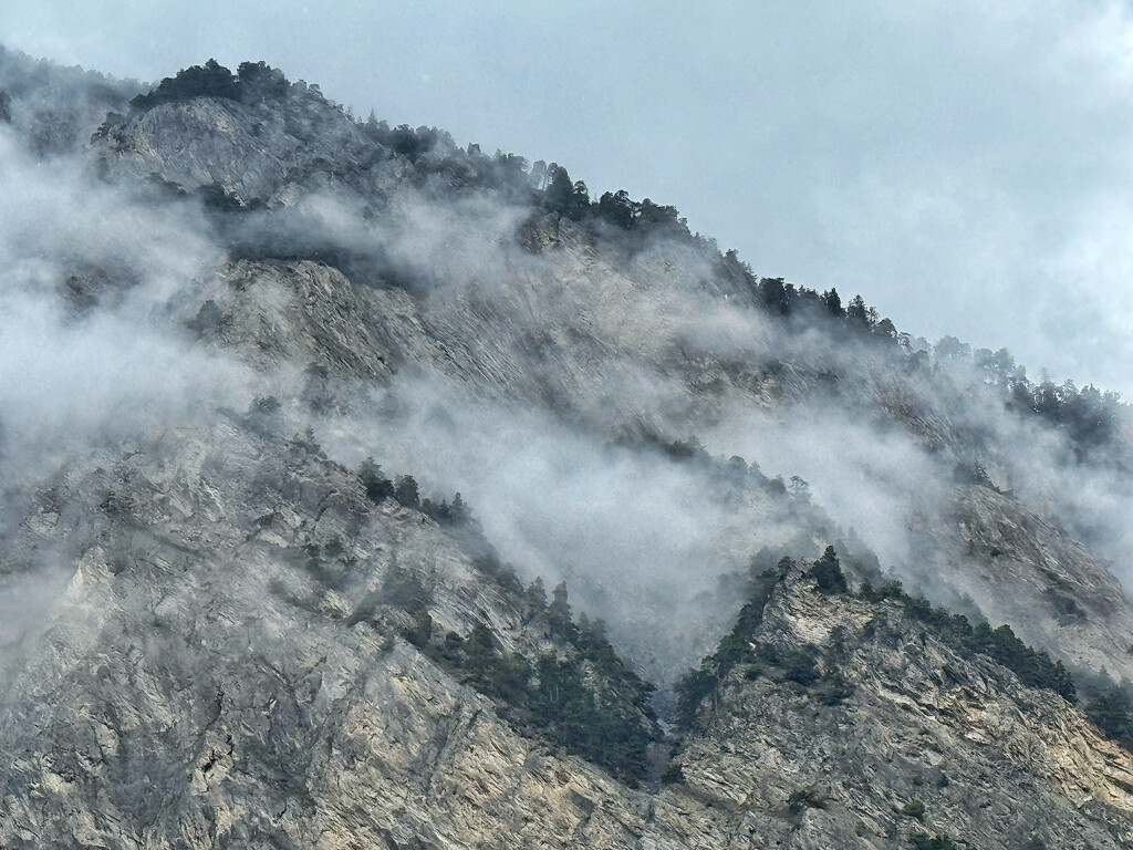 Rocky Mountain and clouds.  by cocobella