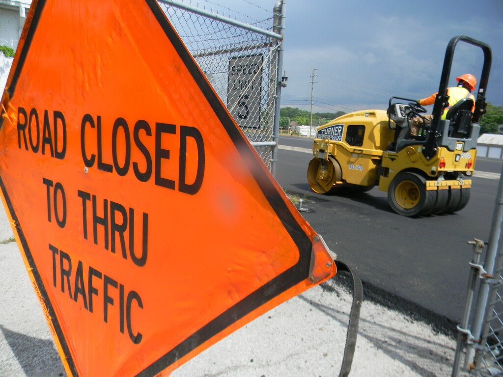 Road Closed Sign and Paving  by sfeldphotos