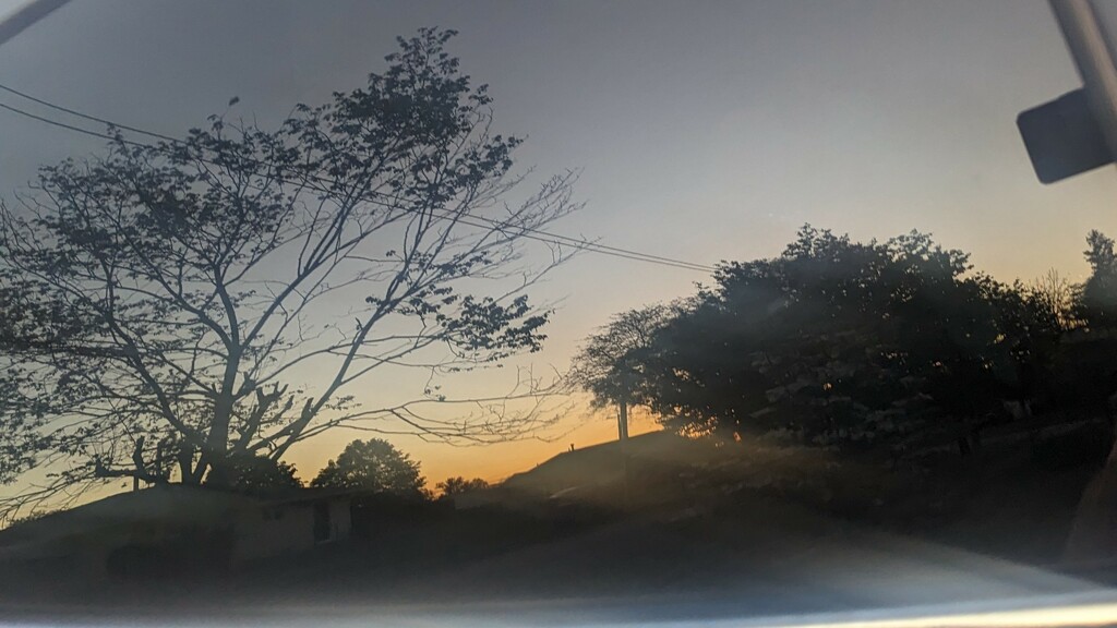 Reflection of a Sunset by photogypsy