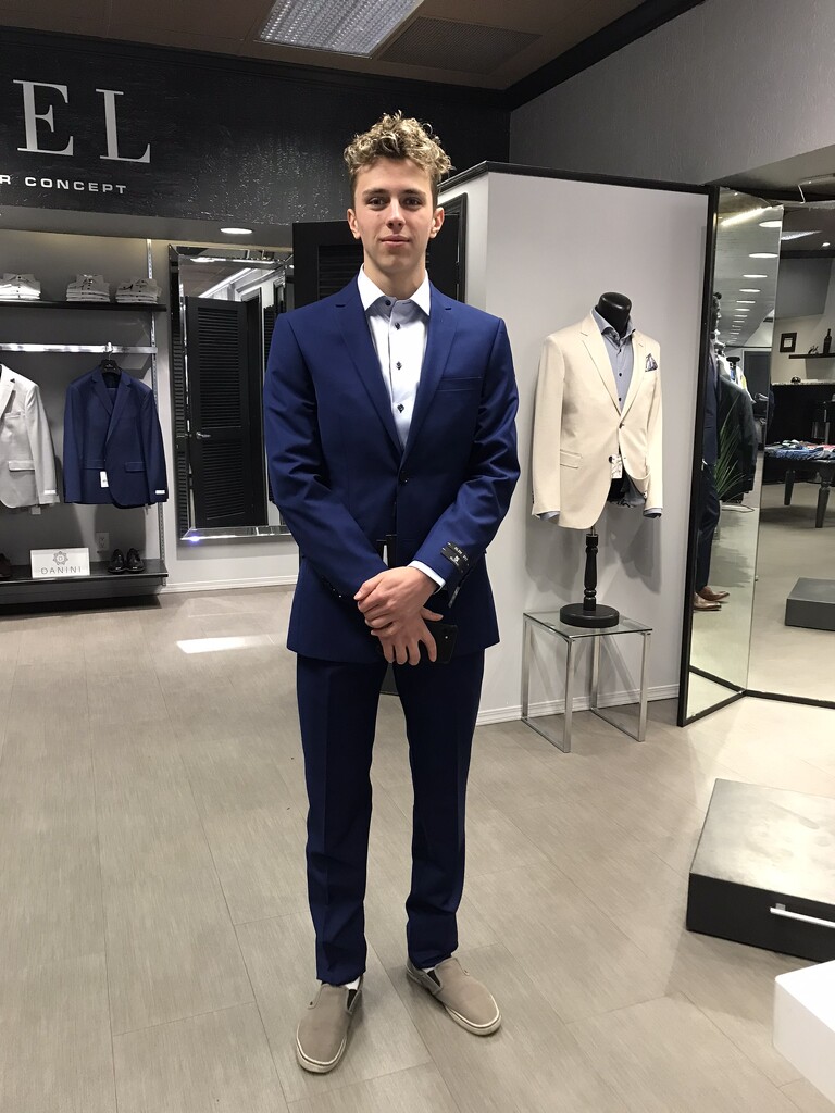 Trying on suits for Grad by kiwichick