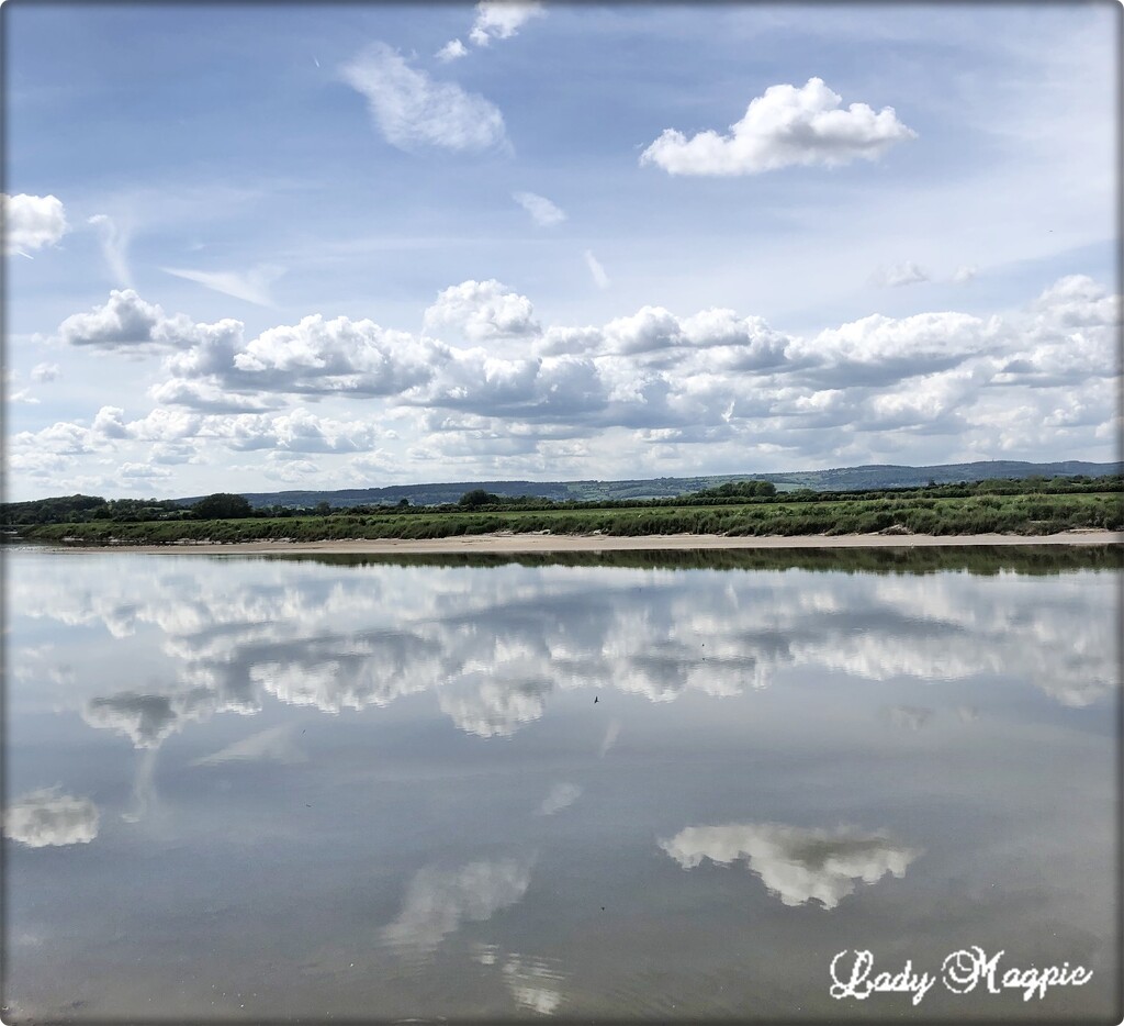 Reflections of the Severn Clouds by ladymagpie