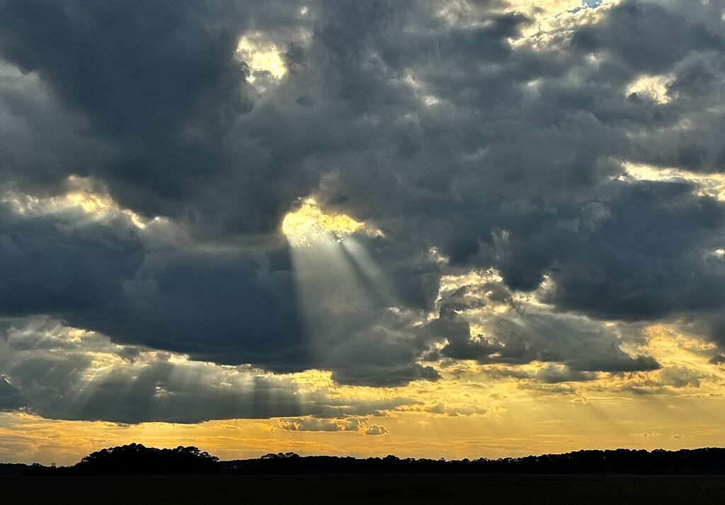 Sun rays and marsh sunset clouds by congaree