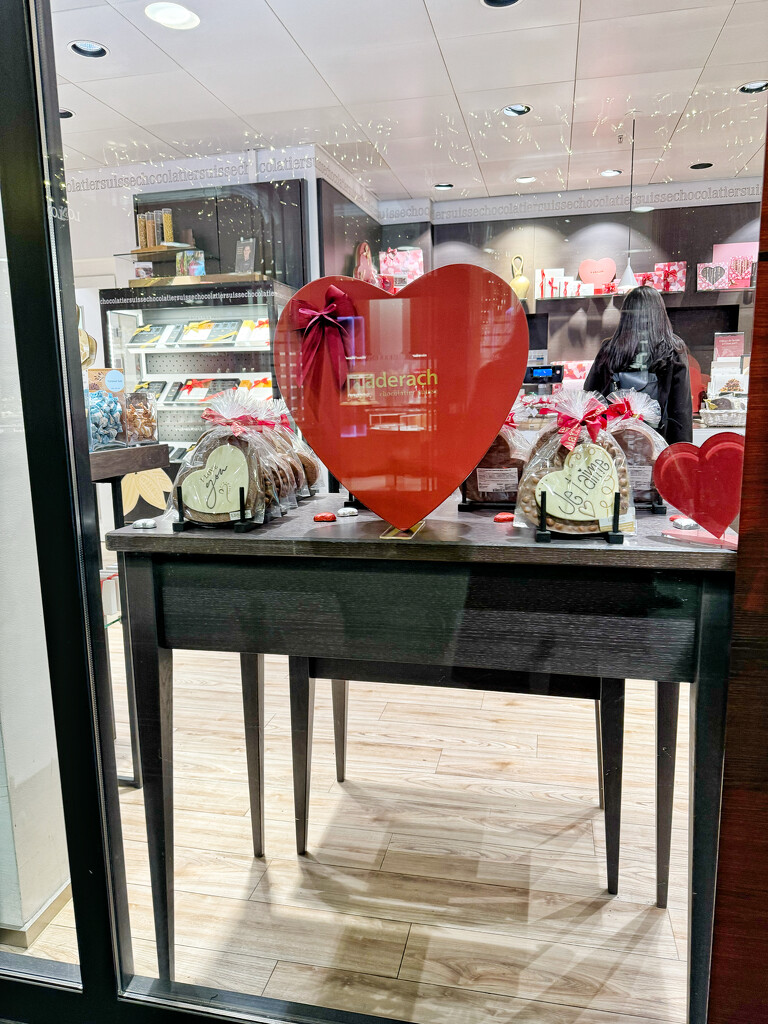 Hearts through a window shop.  by cocobella