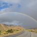 Rainbow Over The Road In Joshua Tree. by bigdad