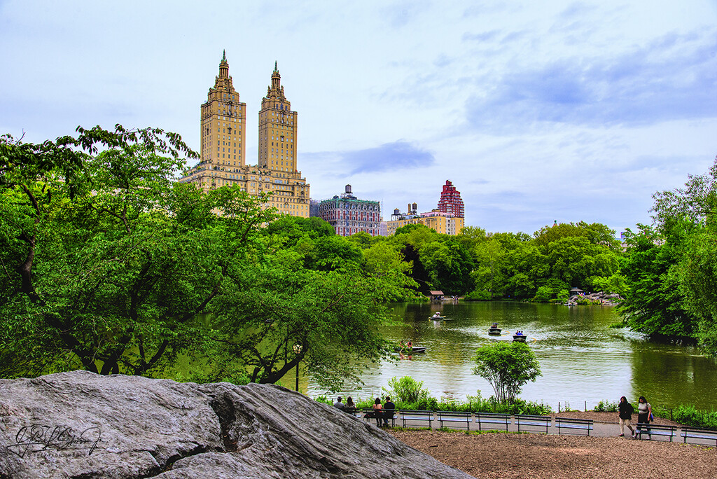Twin towers of The San Remo overlook one of the lakes in Central Park by ggshearron