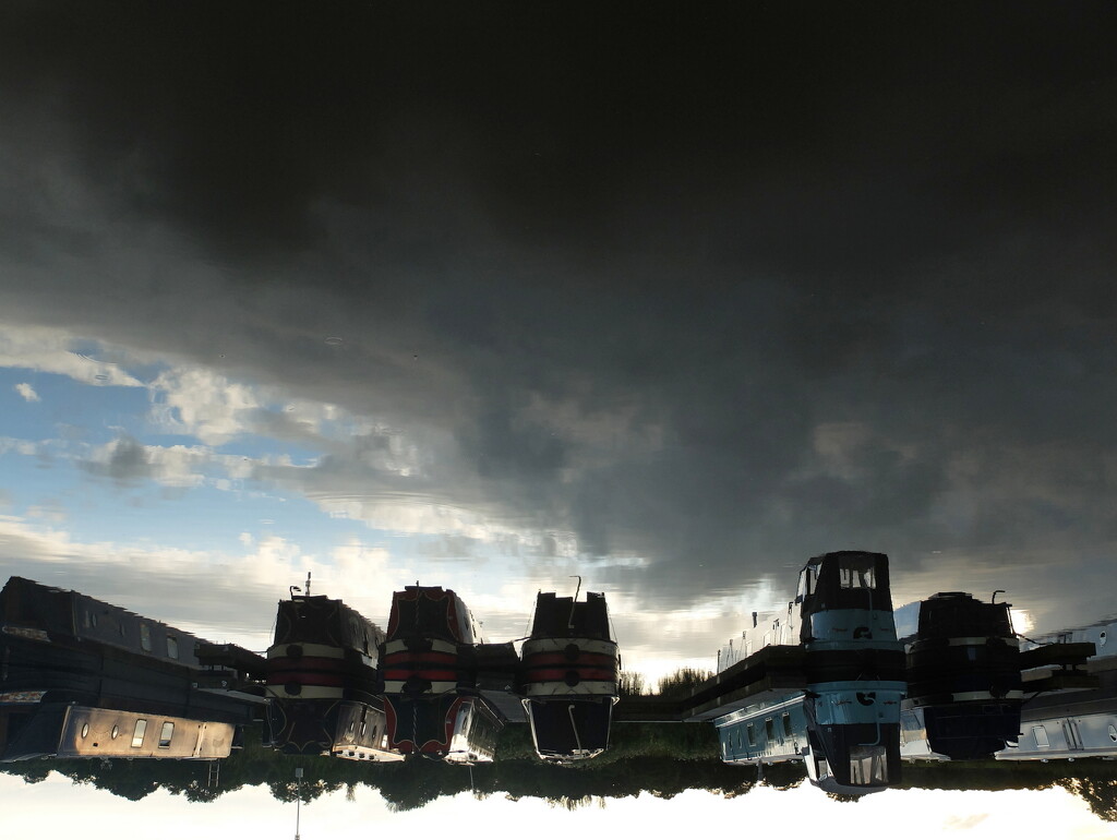 stormy sky reflection by minsky365