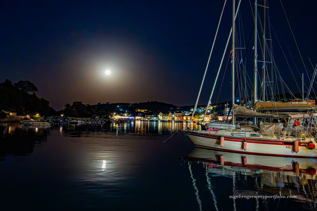 Full moon over Gaios harbour by nigelrogers