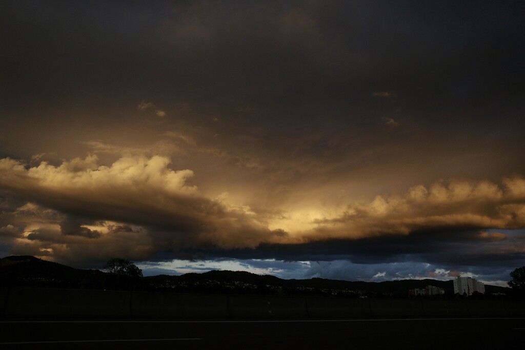 Sunset clouds clash, horizon waits quietly by vincent24