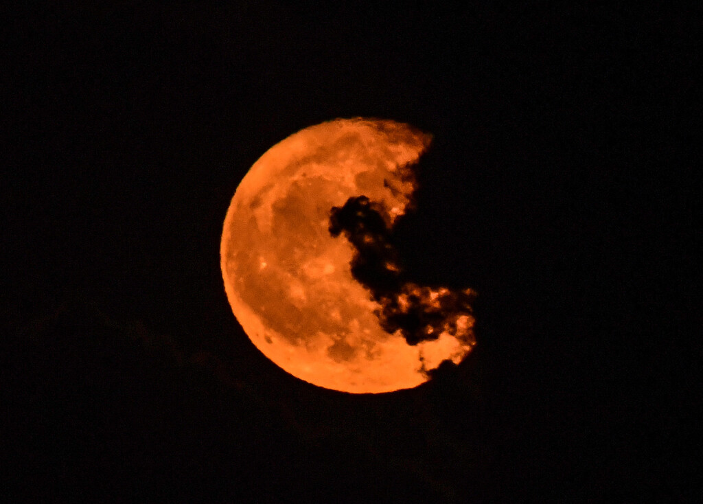 Looming Cloud Over Moon by kareenking