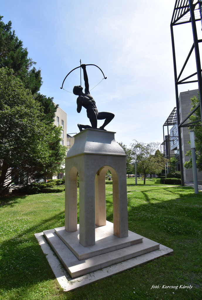 A statue of a Sagittarius boy in a park in Buda by kork