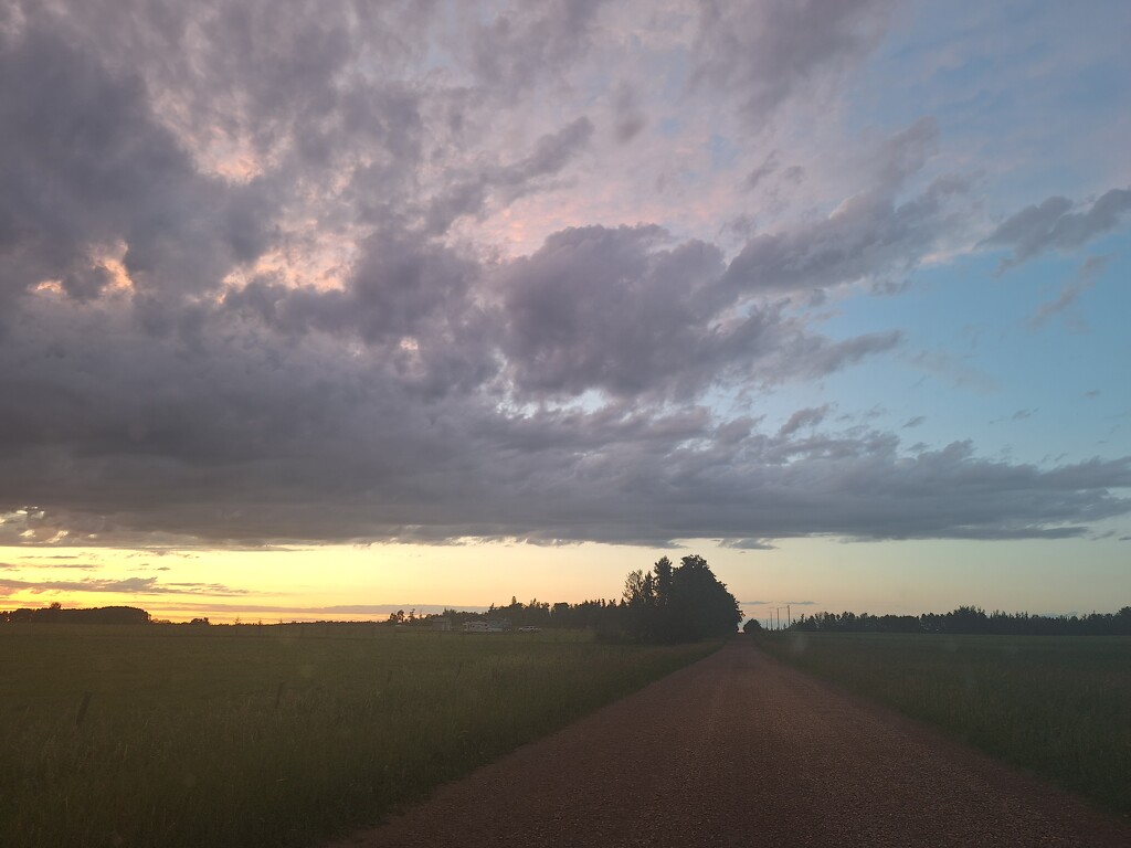 Clouds and a Country Road by bkbinthecity