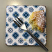 orange cake and fork on tile by brigette