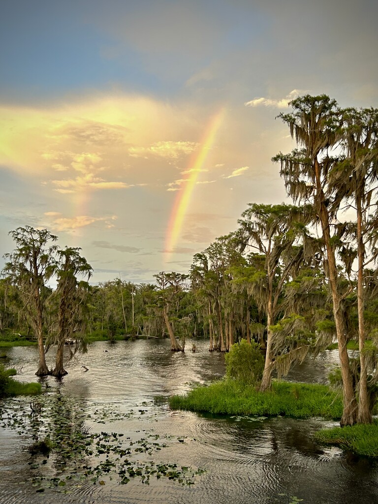 Partial rainbow over the lake by frodob