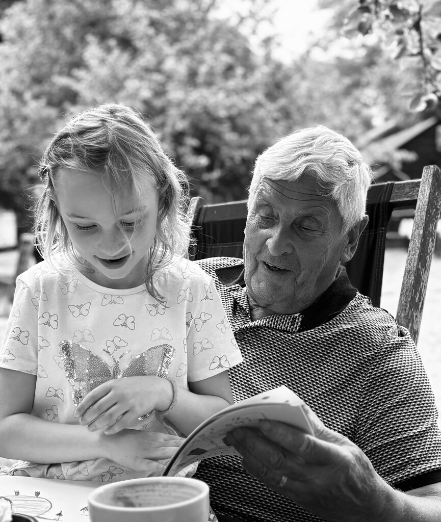 Reading with grandad  by lizgooster