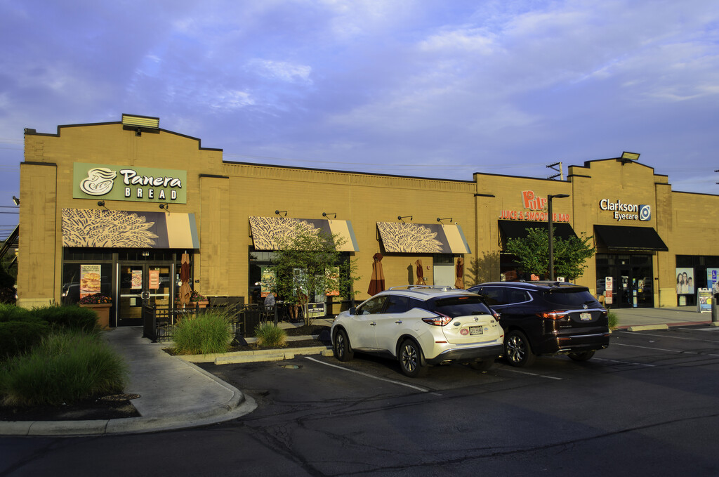 Setting sun casts a golden glow on Panera by ggshearron