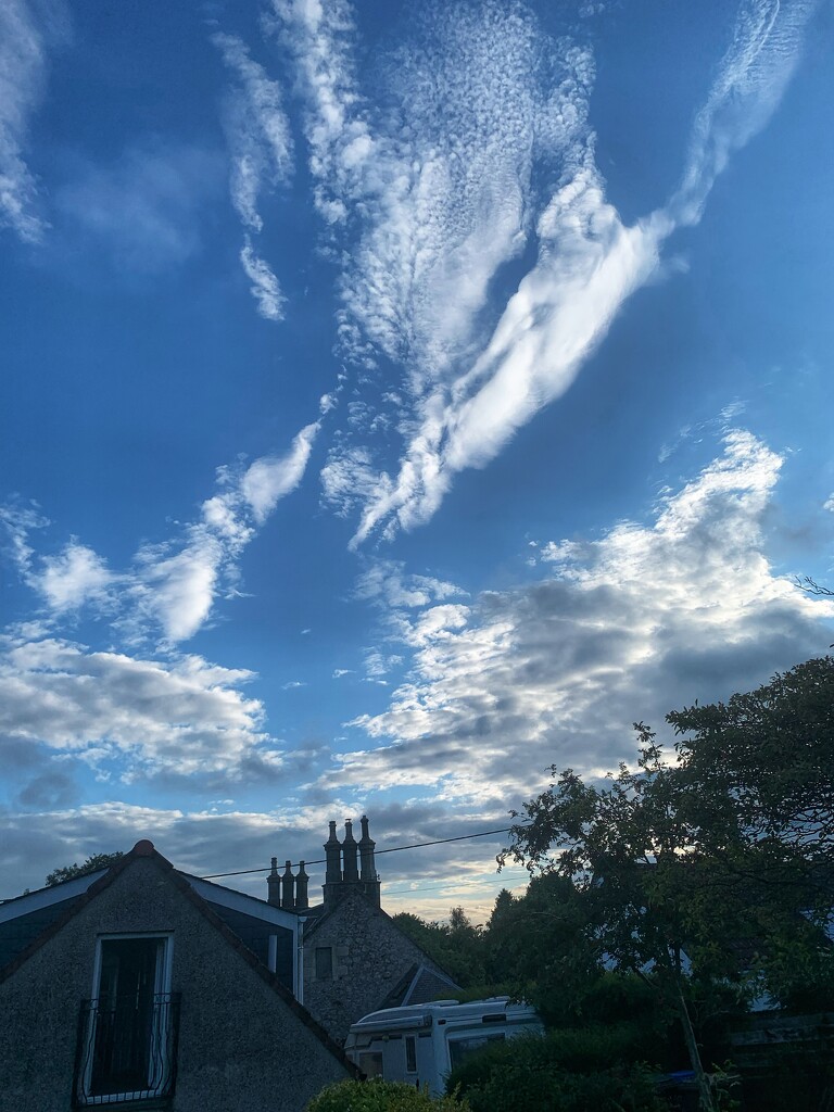 Interesting clouds above the village….. by billdavidson