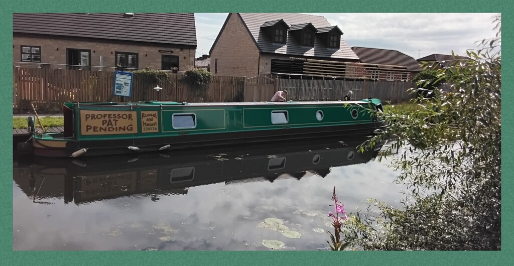 A boat on the Leeds Liverpool canal.  by grace55