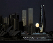 23rd Jul 2024 - The setting moon between two Sydney skyscrapers. 