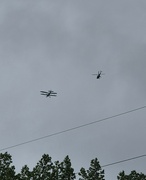 16th Jul 2024 - Bi-plane escorted by a helicopter 