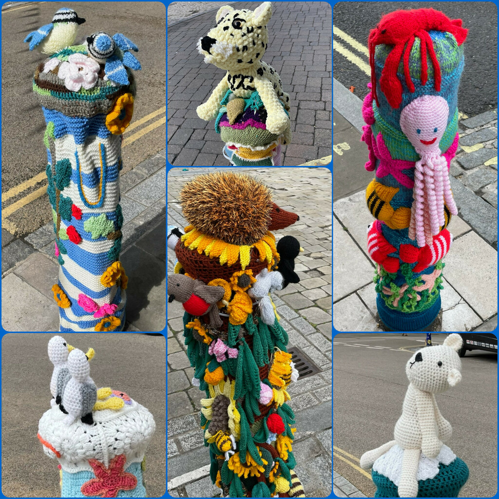 yarn-bombed bollards by quietpurplehaze