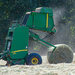 Belching another hay bale... by thewatersphotos