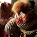 Working on completion of knit hats by sewfree