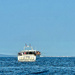 A boat full of fishermen. 