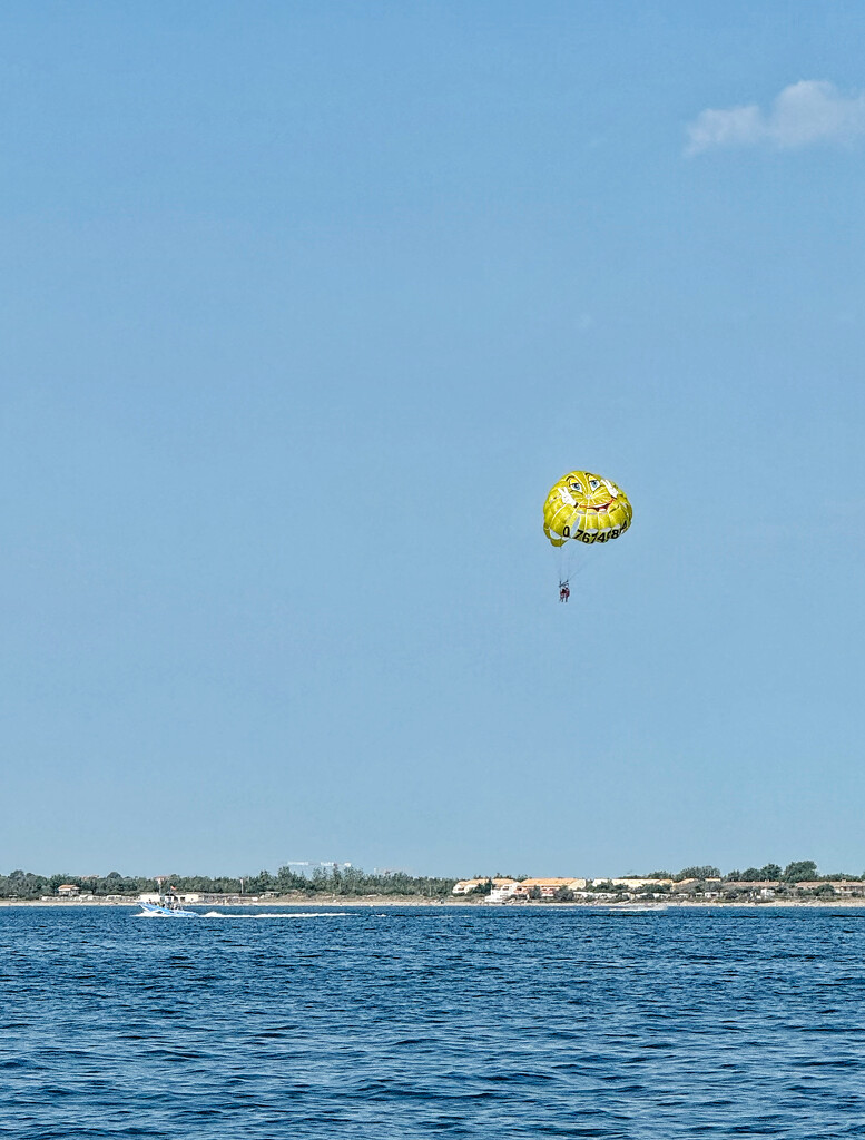 Yellow smiley in the sky.  by cocobella