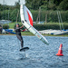 Flying man with mattress standing on large drawing pin by nigelrogers