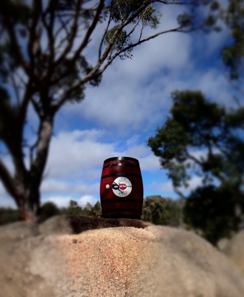 A wine barrel on a granite rock.. by robz