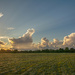 Sunset over the hayfield... by thewatersphotos