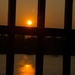 Sunset Thru the Railing by thedarkroom