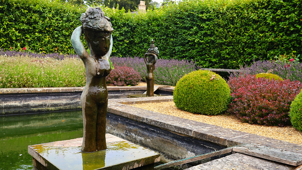 Bronze cast statues at Barnsdale Gardens by neil_ge