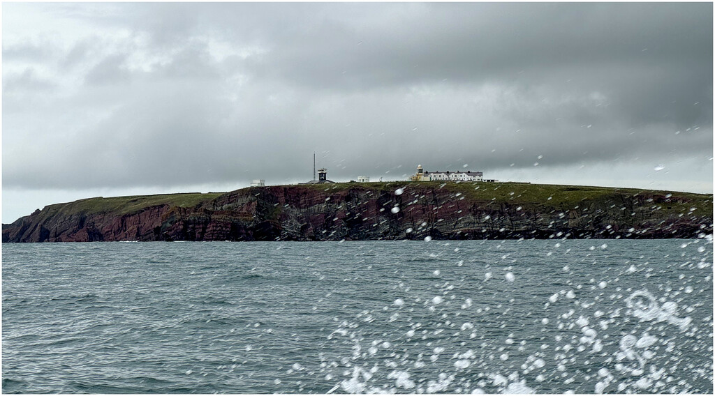 Heading out, to sea, from Milford Haven harbour. by clifford